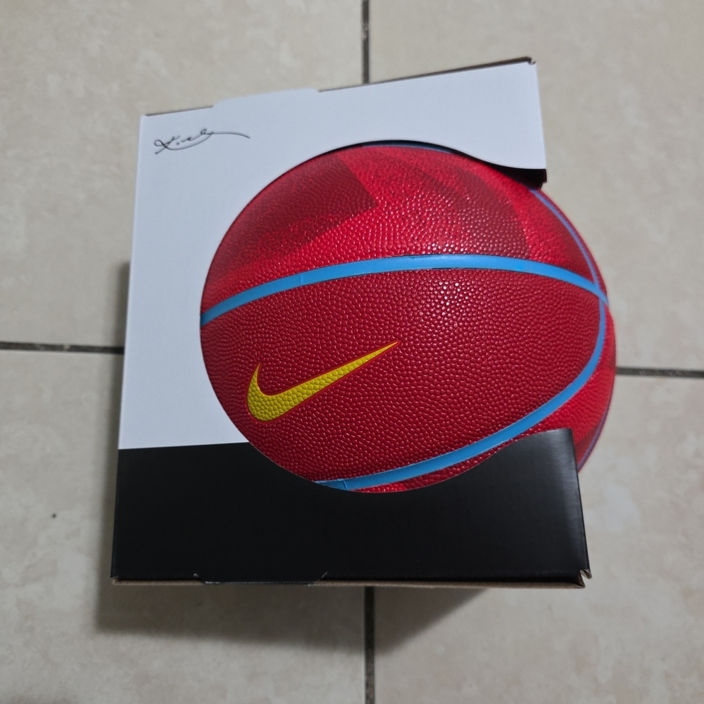 Nike Red Basketball with Blue and Yellow Details